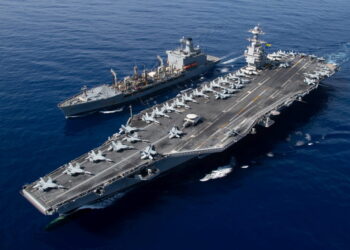 The world’s largest aircraft carrier USS Gerald R. Ford steams alongside USNS Laramie (T-AO-203) during a fueling-at-sea in the eastern Mediterranean Sea, as a scheduled deployment in the U.S Naval Forces Europe area of operations, deployed by U.S. Sixth Fleet to defend U.S, allied, and partners interests, in this photo taken on October, 11, 2023 and released by U.S. Navy on October 14, 2023. U.S Naval Forces Central Command / U.S. 6th Fleet / Handout via REUTERS ATTENTION EDITORS - THIS PICTURE WAS PROVIDED BY A THIRD PARTY